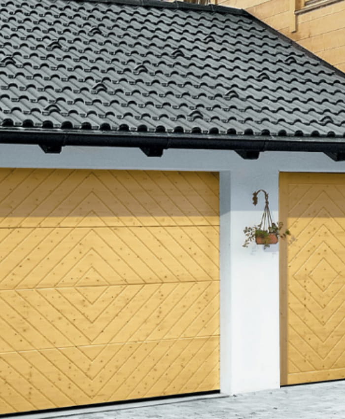 Lighter timber garage door with diamond-style patterning